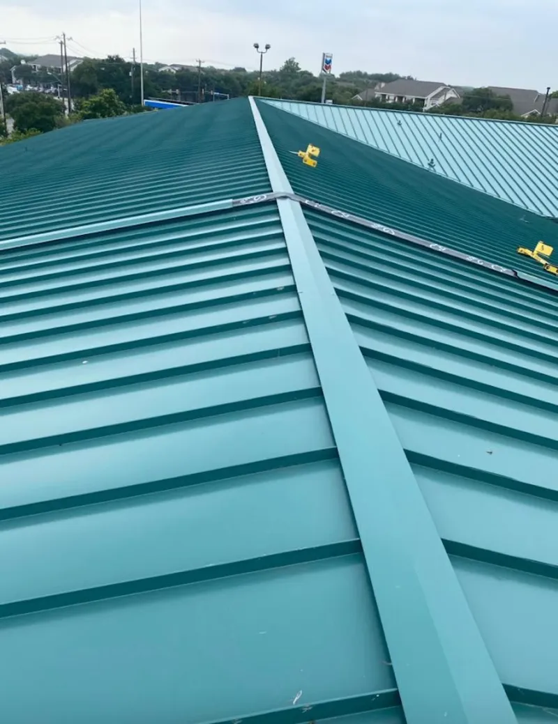 Green commercial metal roof ridge and valley for Metal Roof Repair in Taunton